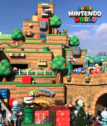 Super Nintendo World at Universal Studios Japan features iconic Mario characters and colorful, blocky scenery.